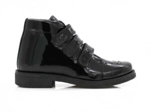 A right-hand side view of the Kinysi Molly Velcro, in Black Patent.