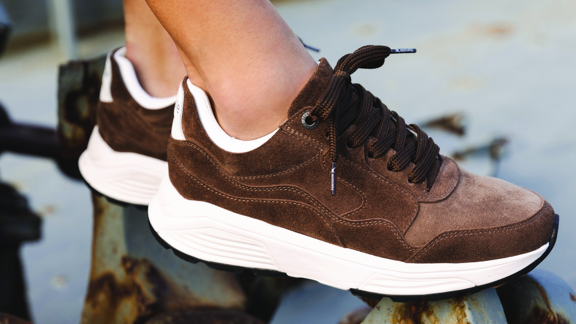 A pair of Xsensible Golden Gates shoes in brown suede, with a close-up view showcasing the unique stretch upper and comfortable fit for hammer toes.