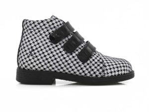 A side view of the Kinysi Ikon Velcro, in Black/White.