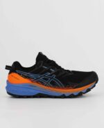 A side view of the Asics Gel Trabuco 10 GTX, in Black/Blue Harmony.