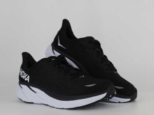 A group view of the HOKA Clifton 8, in Black/White.