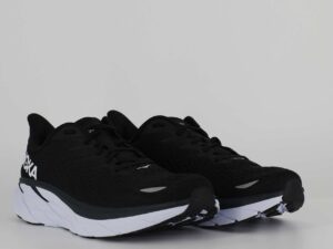 A side view of the HOKA Clifton 8, in Black/White.