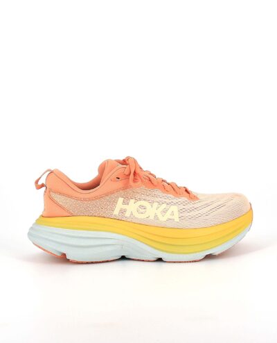 A side view of the HOKA Bondi 8, in Shell Coral/Peach Parfait.