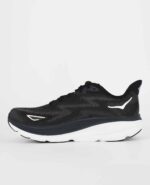 A side view of the HOKA Clifton 9, in Black/White.