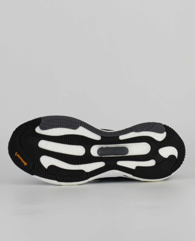 An underside view of the Adidas Solarcontrol, in Core Black/Cloud White/Grey Five.