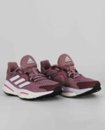 A group view of the Adidas Solarcontrol, in Magic Mauve/Cloud White/Pulse Magenta.