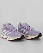 A group view of the Adidas Solarglide 6, in Silver Dawn/Cloud White/Pulse Magenta.