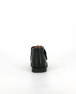The heel of the Kinysi Joe Velcro, in Black Leather.
