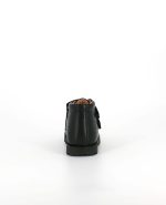 The heel of the Kinysi Joe Velcro, in Black Leather/Scuff Toe.