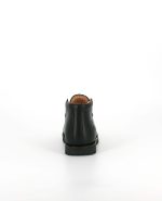 The heel of the Kinysi Charlie, in Black Leather/Scuff Toe.