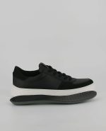 The side of the Ecco Street Tray M with its insole, in Black.