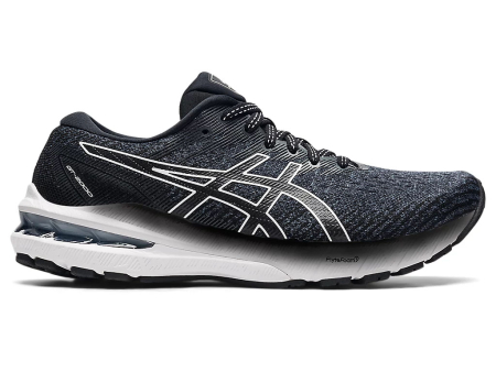 A right-hand side view of the Asics GT 2000 10, in Black/White.